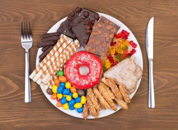 Different Types of Chocolates in a single plate on a wooden table