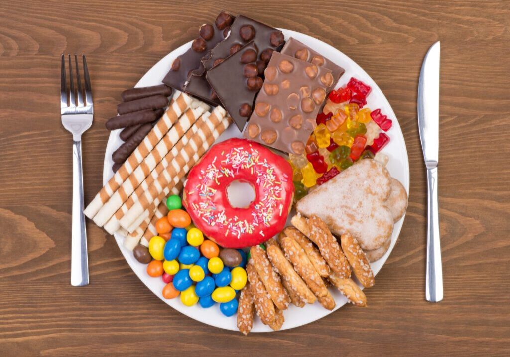 Different Types of Chocolates in a single plate on a wooden table